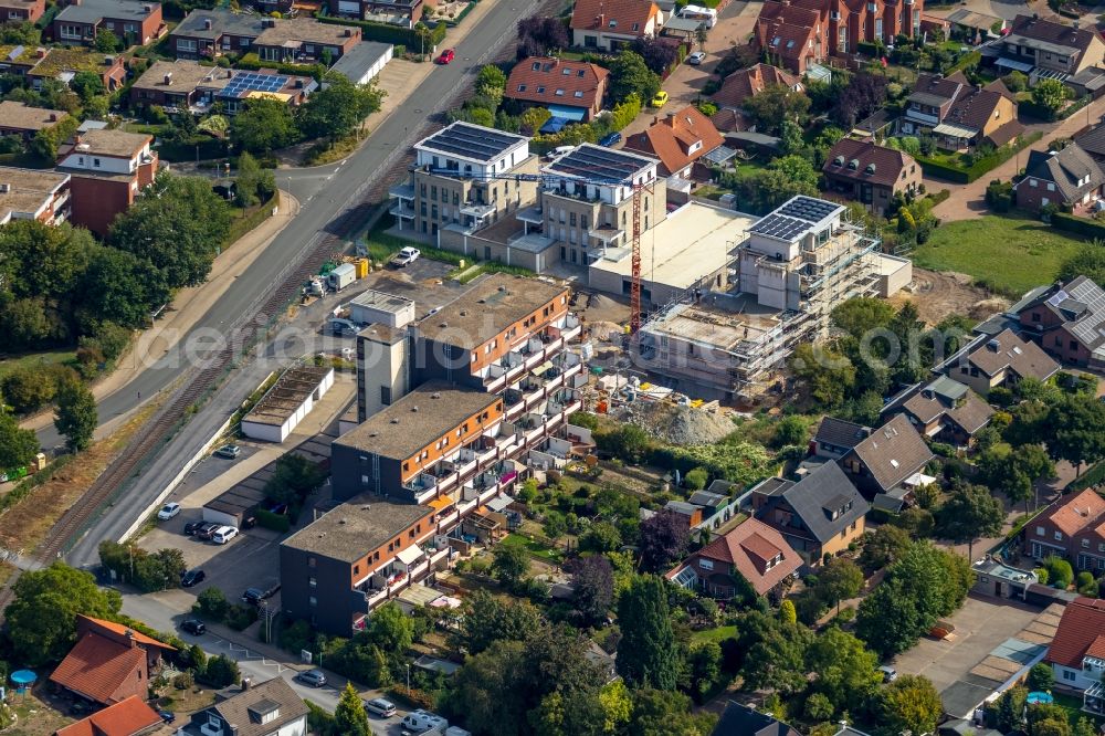 Hamm from the bird's eye view: Construction site to build a new multi-family residential complex at Grenzweg and Alter Papelweg in Hamm in the state North Rhine-Westphalia, Germany