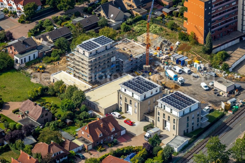 Hamm from the bird's eye view: Construction site to build a new multi-family residential complex at Grenzweg and Alter Papelweg in Hamm in the state North Rhine-Westphalia, Germany