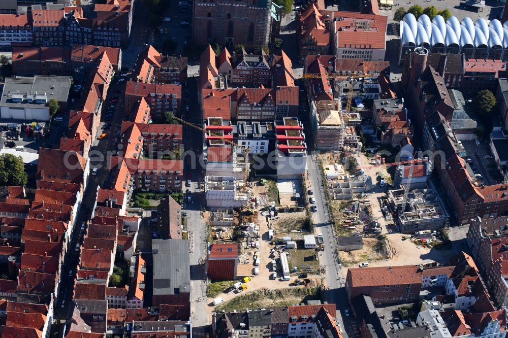 Lübeck from the bird's eye view: Construction site to build a new multi-family residential complex Fischstrasse - Braunstrasse in Gruenderviertel in the district Innenstadt in Luebeck in the state Schleswig-Holstein, Germany