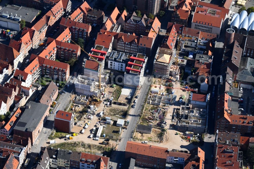 Lübeck from the bird's eye view: Construction site to build a new multi-family residential complex Fischstrasse - Braunstrasse in Gruenderviertel in the district Innenstadt in Luebeck in the state Schleswig-Holstein, Germany