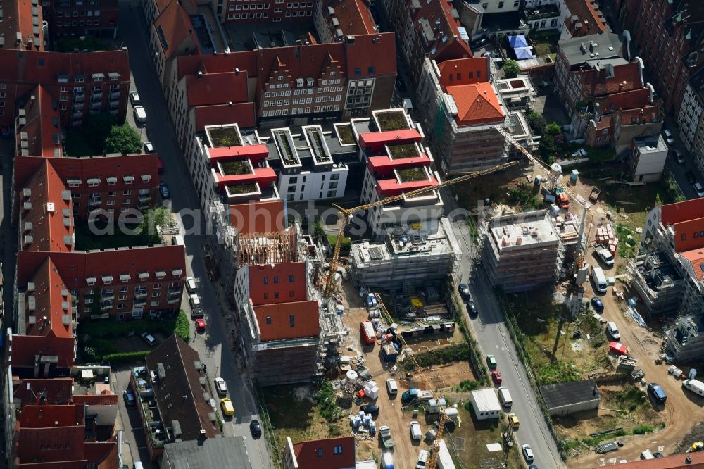 Lübeck from the bird's eye view: Construction site to build a new multi-family residential complex Gruendungsviertel der Grundstuecksgesellschaft TRAVE mbH in Luebeck in the state Schleswig-Holstein