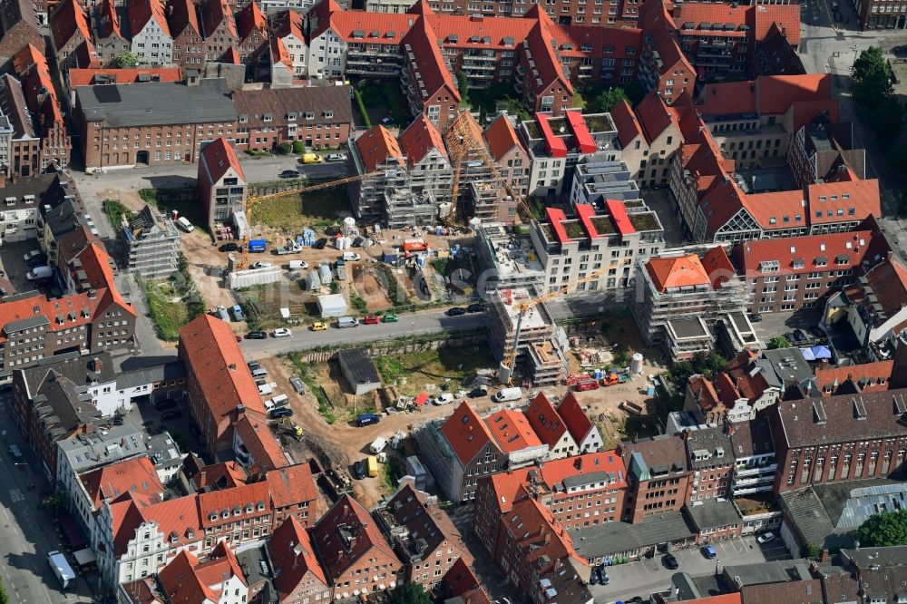 Lübeck from the bird's eye view: Construction site to build a new multi-family residential complex Gruendungsviertel der Grundstuecksgesellschaft TRAVE mbH in Luebeck in the state Schleswig-Holstein