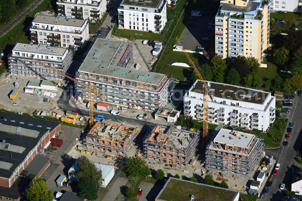 Neusäß from the bird's eye view: Construction site to build a new multi-family residential complex on Gustav-Mahler-Strasse in Neusaess in the state Bavaria, Germany