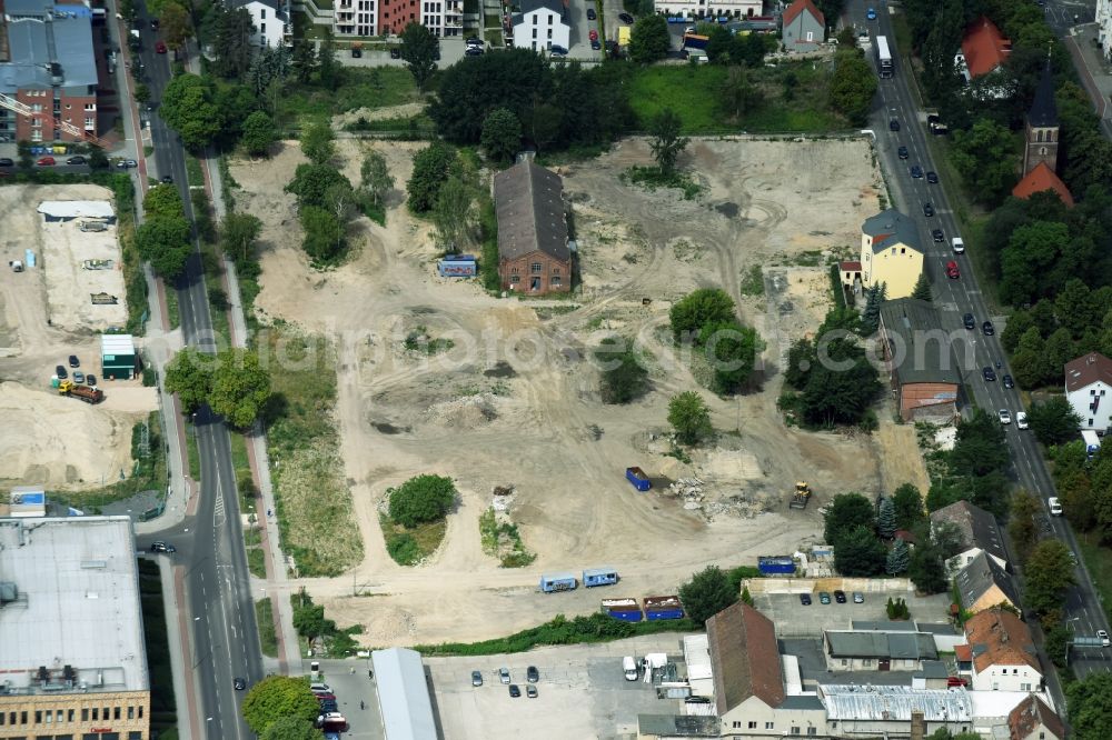 Berlin from the bird's eye view: Construction site to build a new multi-family residential complex of Gut Alt-Biesdorf on Weissenhoeher Strasse in Berlin, Germany