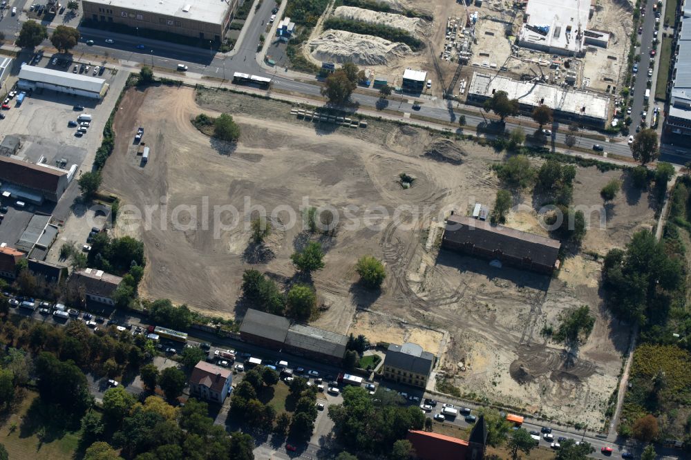 Berlin from above - Construction site to build a new multi-family residential complex of Gut Alt-Biesdorf on Weissenhoeher Strasse in Berlin, Germany