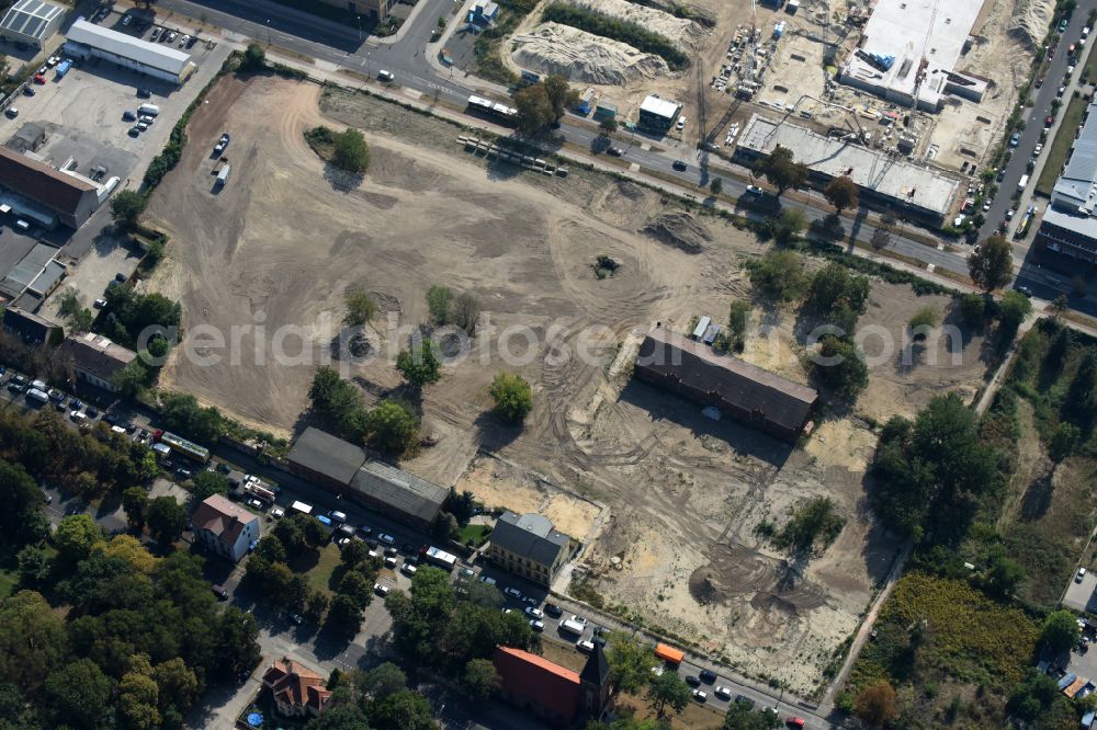 Berlin from the bird's eye view: Construction site to build a new multi-family residential complex of Gut Alt-Biesdorf on Weissenhoeher Strasse in Berlin, Germany