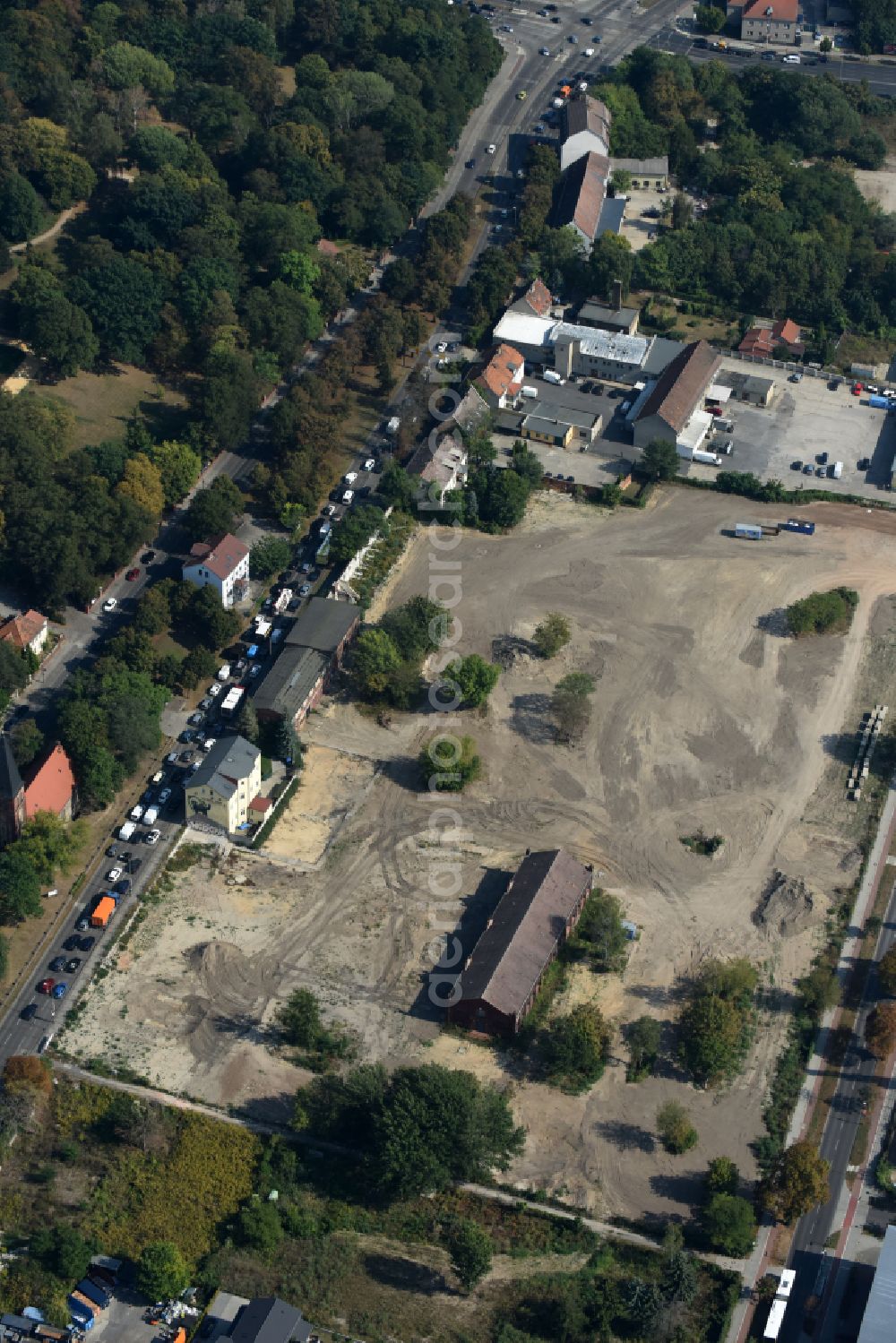 Berlin from the bird's eye view: Construction site to build a new multi-family residential complex of Gut Alt-Biesdorf on Weissenhoeher Strasse in Berlin, Germany