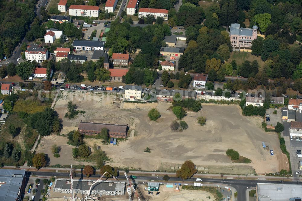 Berlin from above - Construction site to build a new multi-family residential complex of Gut Alt-Biesdorf on Weissenhoeher Strasse in Berlin, Germany