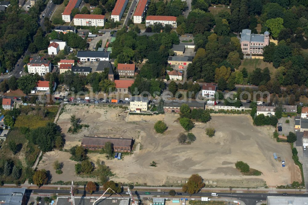 Berlin from the bird's eye view: Construction site to build a new multi-family residential complex of Gut Alt-Biesdorf on Weissenhoeher Strasse in Berlin, Germany