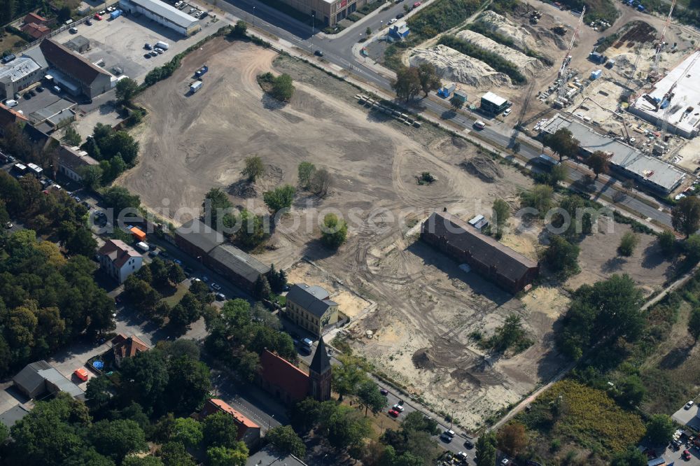 Berlin from the bird's eye view: Construction site to build a new multi-family residential complex of Gut Alt-Biesdorf on Weissenhoeher Strasse in Berlin, Germany