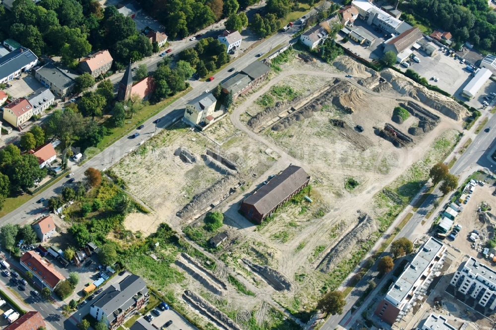 Berlin from the bird's eye view: Construction site to build a new multi-family residential complex of Gut Alt-Biesdorf on Weissenhoeher Strasse in Berlin, Germany