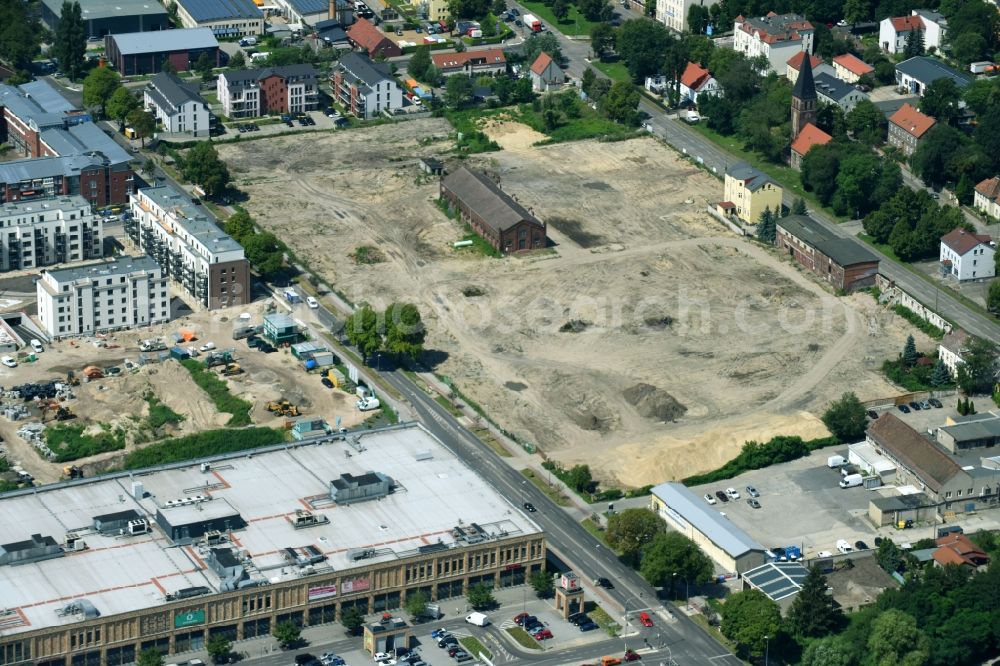 Berlin from the bird's eye view: Construction site to build a new multi-family residential complex of Gut Alt-Biesdorf on Weissenhoeher Strasse in Berlin, Germany