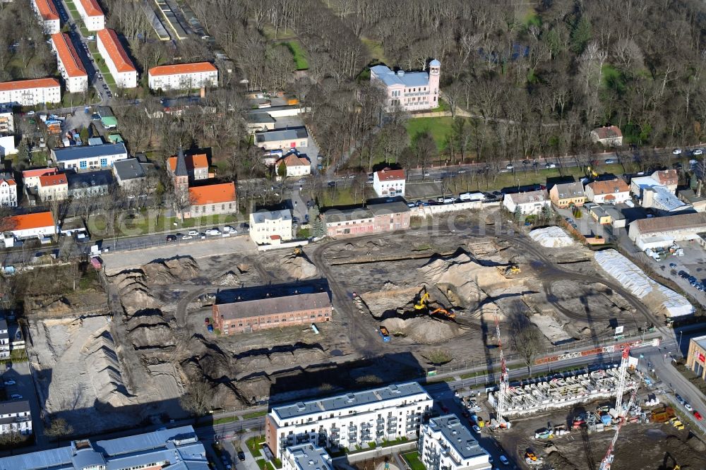 Berlin from the bird's eye view: Construction site to build a new multi-family residential complex of Gut Alt-Biesdorf on Weissenhoeher Strasse in Berlin, Germany