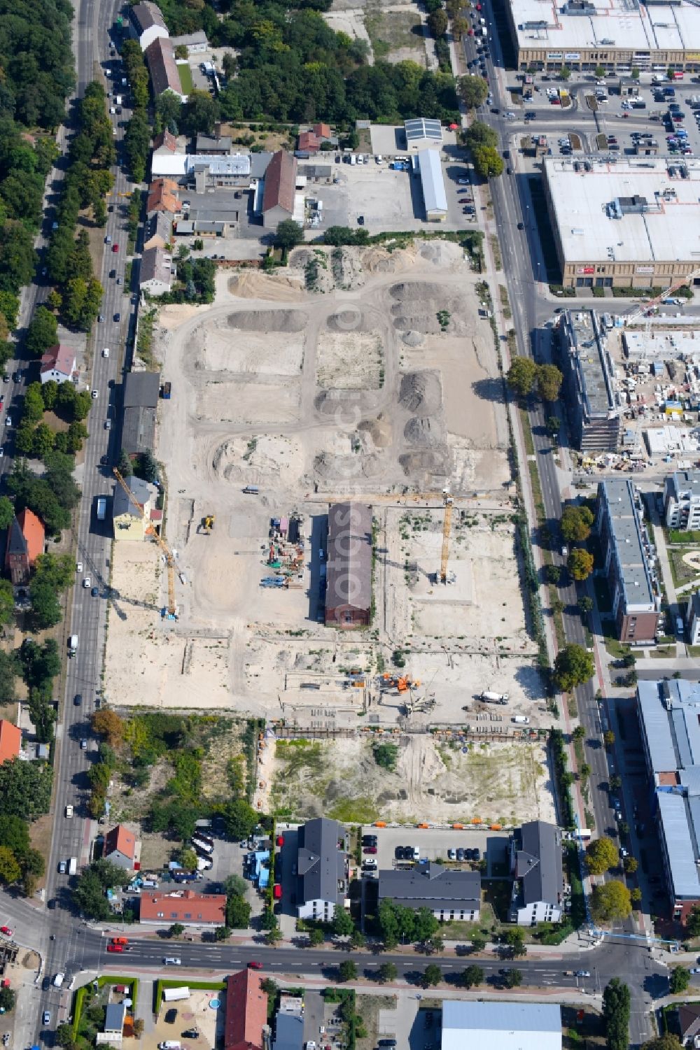 Berlin from above - Construction site to build a new multi-family residential complex of Gut Alt-Biesdorf on Weissenhoeher Strasse in Berlin, Germany