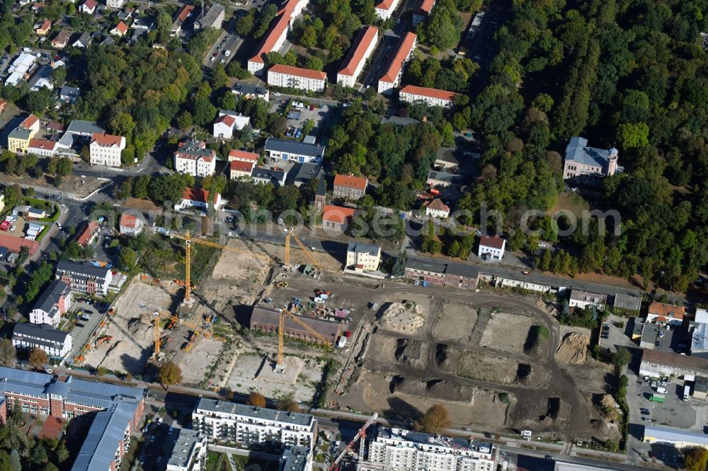 Berlin from the bird's eye view: Construction site to build a new multi-family residential complex of Gut Alt-Biesdorf on Weissenhoeher Strasse in Berlin, Germany