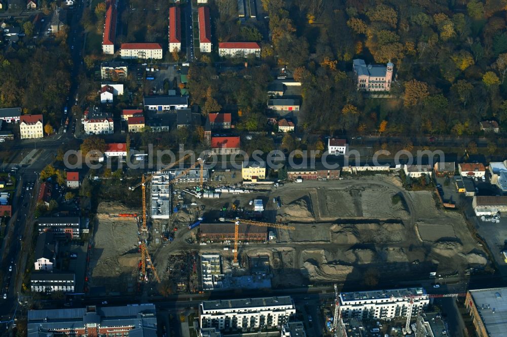 Berlin from the bird's eye view: Construction site to build a new multi-family residential complex of Gut Alt-Biesdorf on Weissenhoeher Strasse in Berlin, Germany