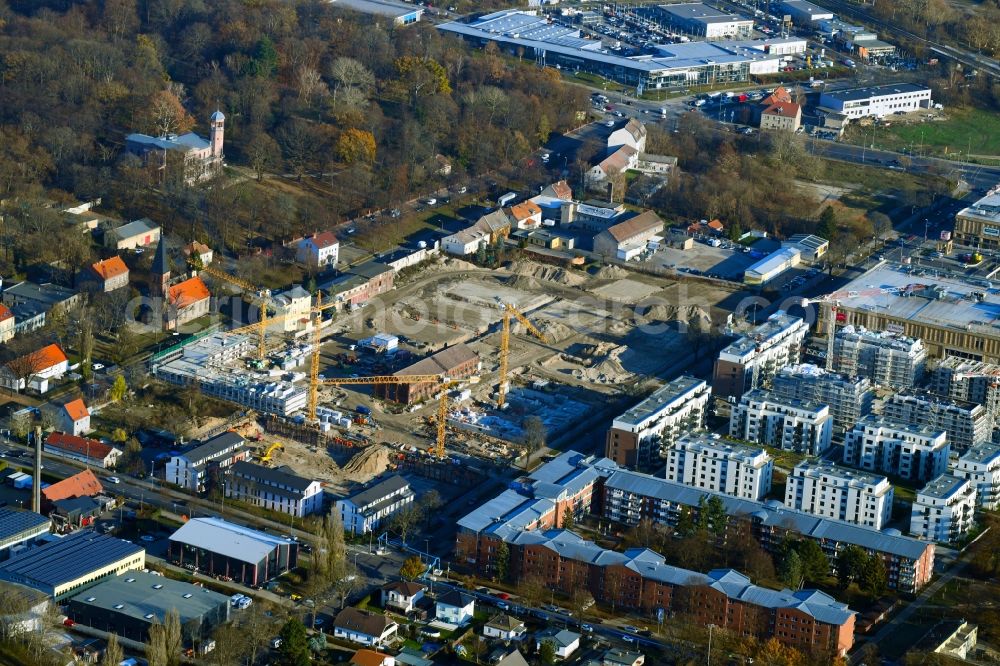 Berlin from above - Construction site to build a new multi-family residential complex of Gut Alt-Biesdorf on Weissenhoeher Strasse in Berlin, Germany