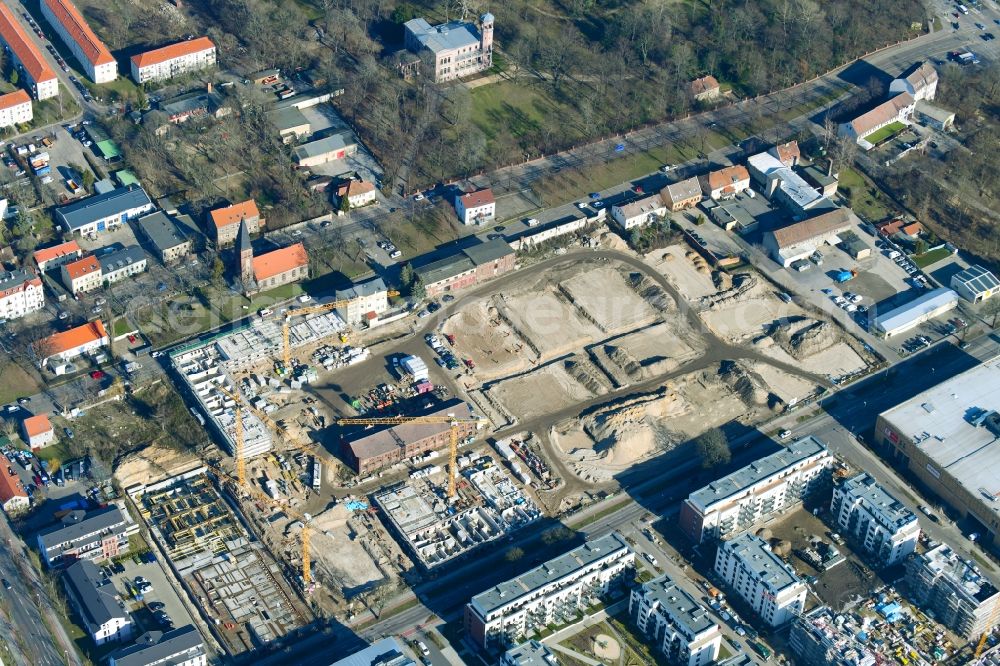 Berlin from above - Construction site to build a new multi-family residential complex of Gut Alt-Biesdorf on Weissenhoeher Strasse in Berlin, Germany