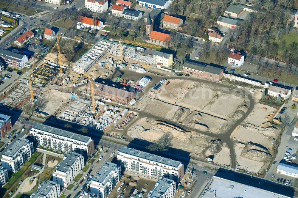 Berlin from above - Construction site to build a new multi-family residential complex of Gut Alt-Biesdorf on Weissenhoeher Strasse in Berlin, Germany