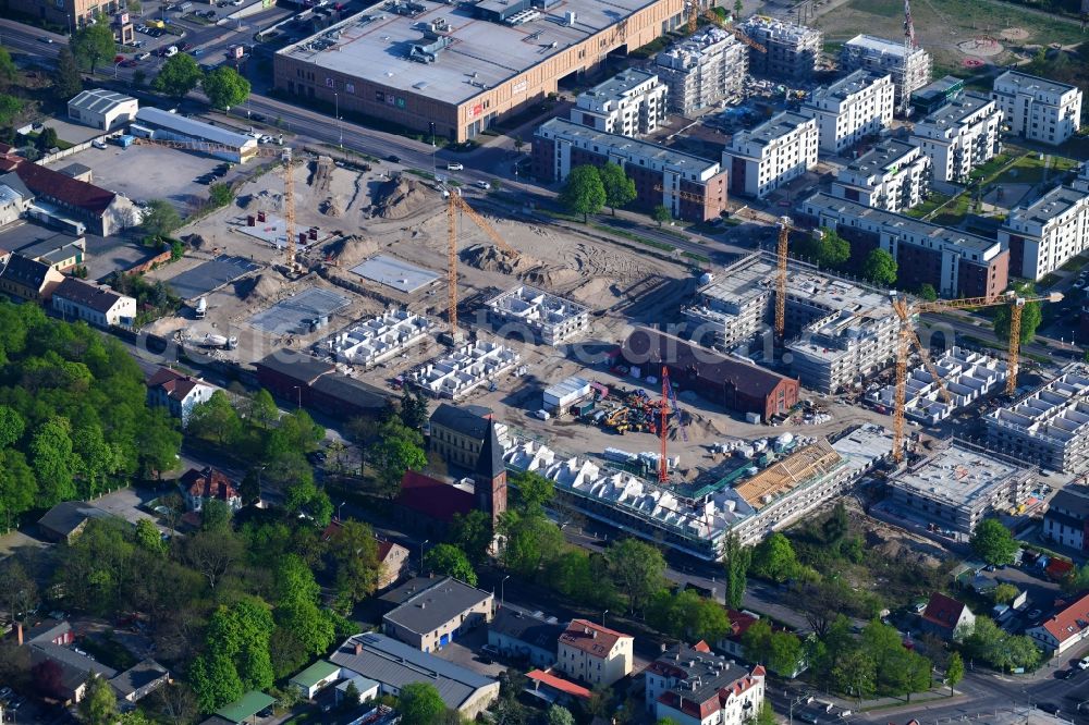 Berlin from above - Construction site to build a new multi-family residential complex of Gut Alt-Biesdorf on Weissenhoeher Strasse in Berlin, Germany