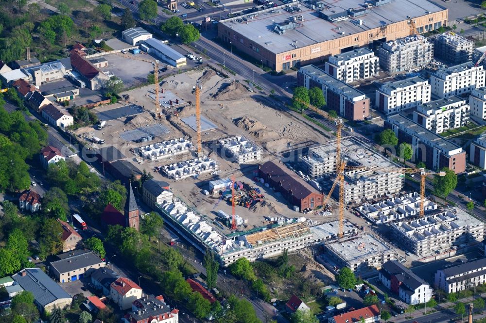 Berlin from the bird's eye view: Construction site to build a new multi-family residential complex of Gut Alt-Biesdorf on Weissenhoeher Strasse in Berlin, Germany