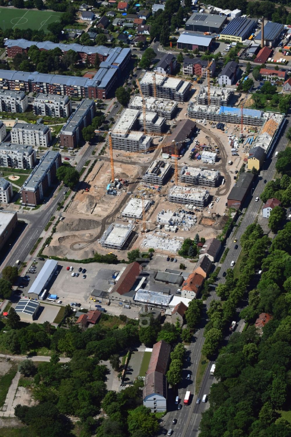 Aerial image Berlin - Construction site to build a new multi-family residential complex of Gut Alt-Biesdorf on Weissenhoeher Strasse in Berlin, Germany