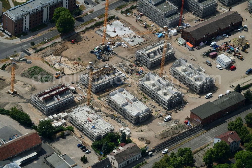 Berlin from above - Construction site to build a new multi-family residential complex of Gut Alt-Biesdorf on Weissenhoeher Strasse in Berlin, Germany