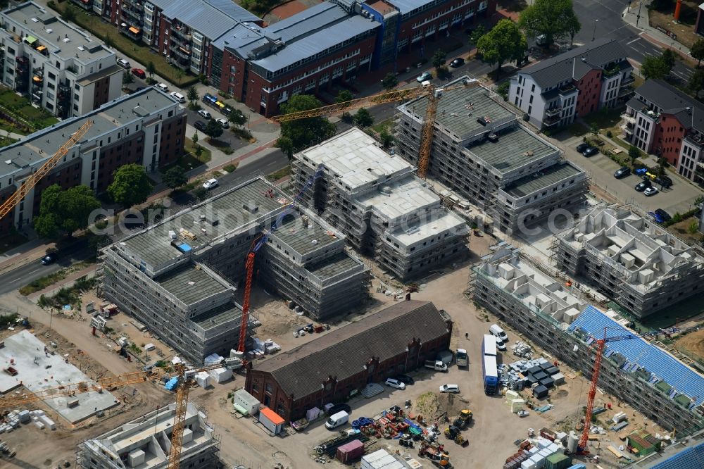 Aerial image Berlin - Construction site to build a new multi-family residential complex of Gut Alt-Biesdorf on Weissenhoeher Strasse in Berlin, Germany