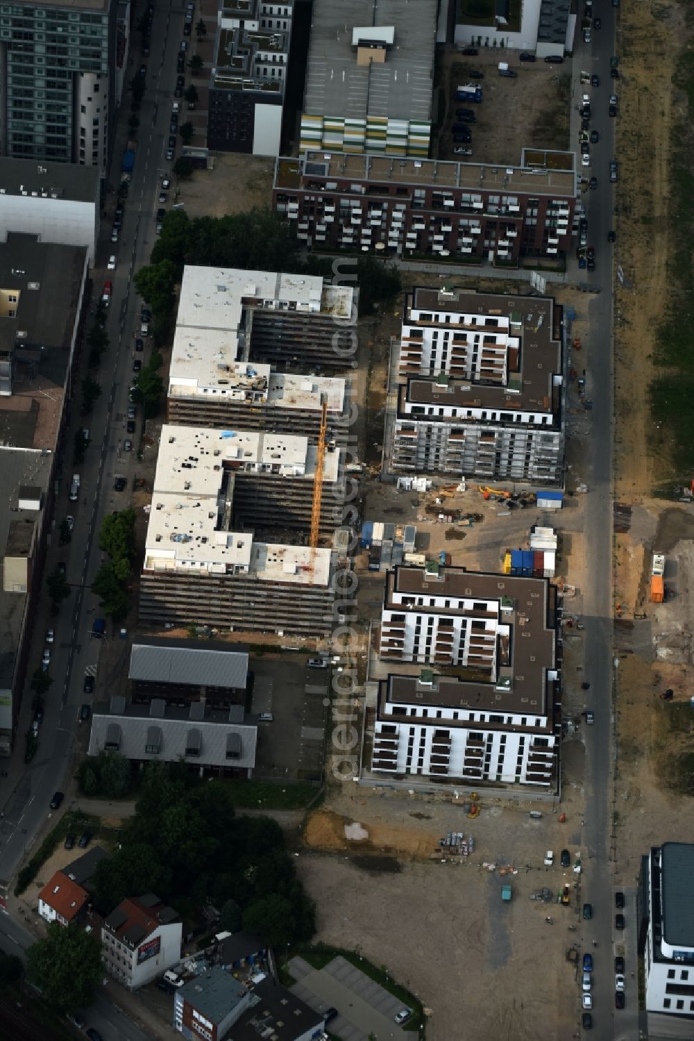 Aerial photograph Hamburg - Construction site to build a new multi-family residential complex at the Schellerdamm in Hamburg. The HOCHTIEF incorporated company is building, according to instructions of architect Heiner Limbrock, for owner Aurelius Immobilien AG a modern housing area