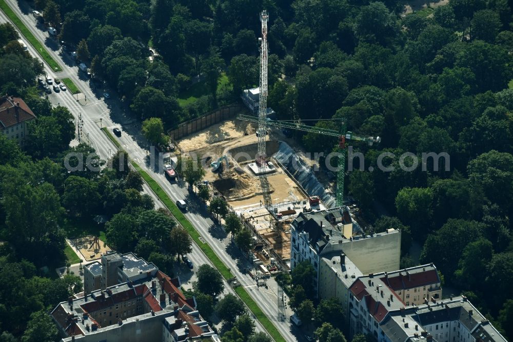 Berlin from above - Construction site to build a new multi-family residential complex on Hasenheide in the district Neukoelln in Berlin, Germany