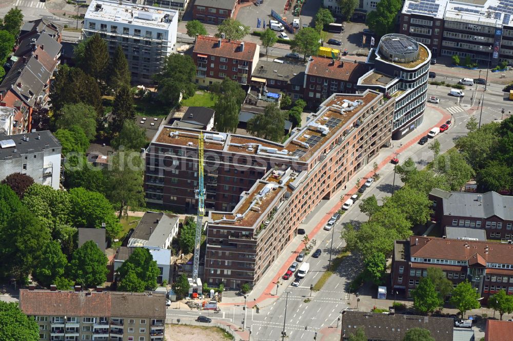 Hamburg from above - Construction site to build a new multi-family residential complex along the Drosselstrasse in the district Barmbek in Hamburg, Germany