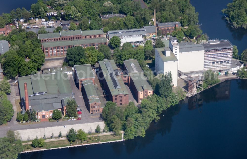 Aerial image Berlin - Construction site for the construction of an apartment building on the Havel island of Eiswerder in the district of Hakenfelde in Berlin, Germany