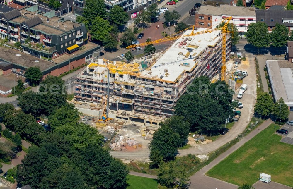 Bottrop from the bird's eye view: Construction site to build a new multi-family residential complex der Heinrich Huetter GmbH & Co. KG an der Hauptstrasse in Bottrop in the state North Rhine-Westphalia