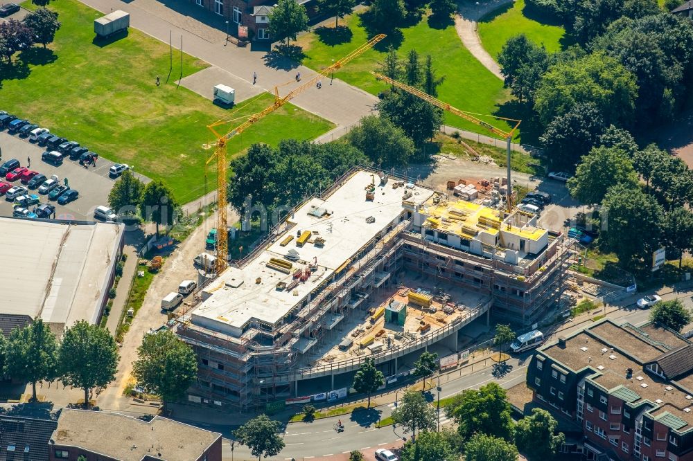 Bottrop from the bird's eye view: Construction site to build a new multi-family residential complex der Heinrich Huetter GmbH & Co. KG an der Hauptstrasse in Bottrop in the state North Rhine-Westphalia