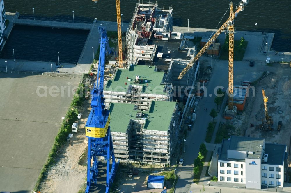 Rostock from above - Construction site to build a new multi-family residential complex Hellingstrasse in Rostock in the state Mecklenburg - Western Pomerania, Germany