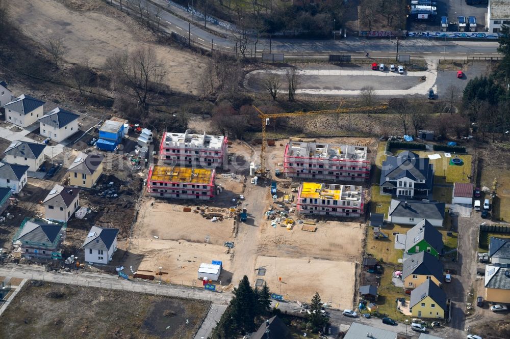 Berlin from the bird's eye view: Construction site to build a new multi-family residential complex Hermineweg - Theodorstrasse in the district Mahlsdorf in Berlin, Germany