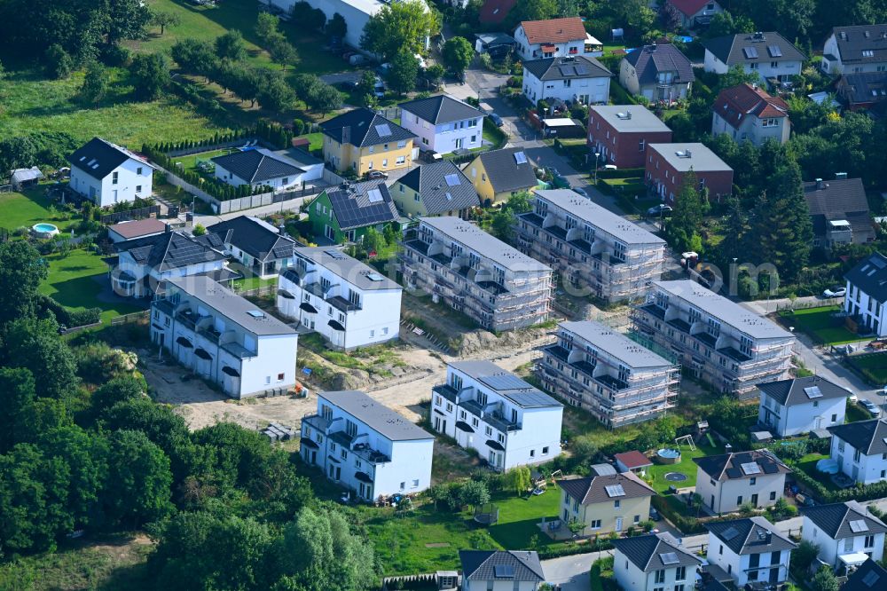 Berlin from the bird's eye view: Construction site to build a new multi-family residential complex Hermineweg - Theodorstrasse in the district Mahlsdorf in Berlin, Germany