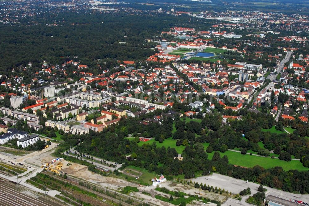 München from the bird's eye view: Construction site to build a new multi-family residential complex Am Hirschgarten in the district Neuhausen-Nymphenburg in Munich in the state Bavaria, Germany