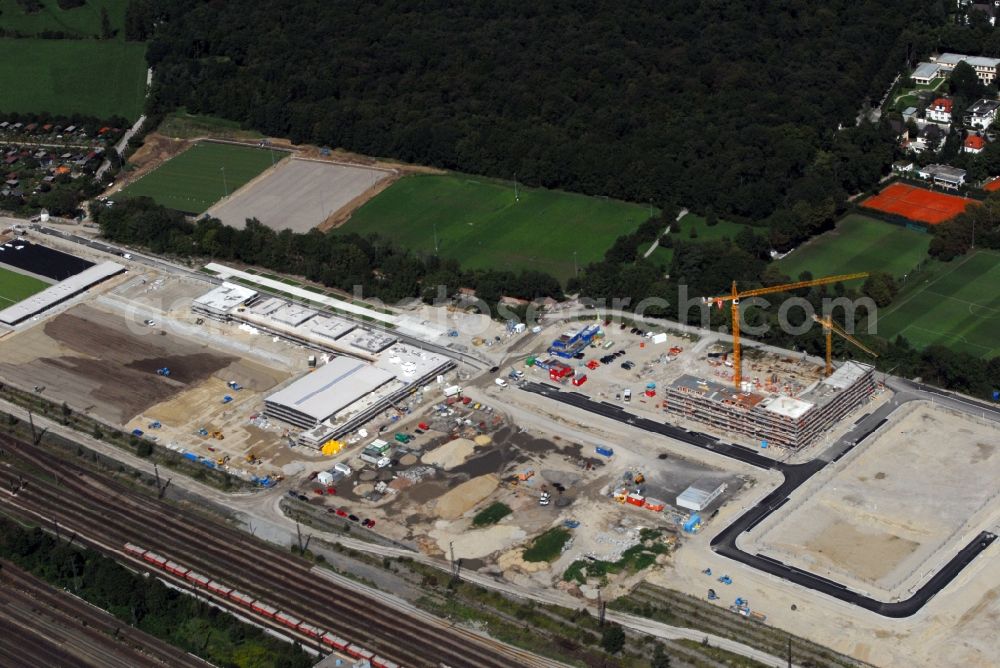 München from the bird's eye view: Construction site to build a new multi-family residential complex Am Hirschgarten in the district Neuhausen-Nymphenburg in Munich in the state Bavaria, Germany