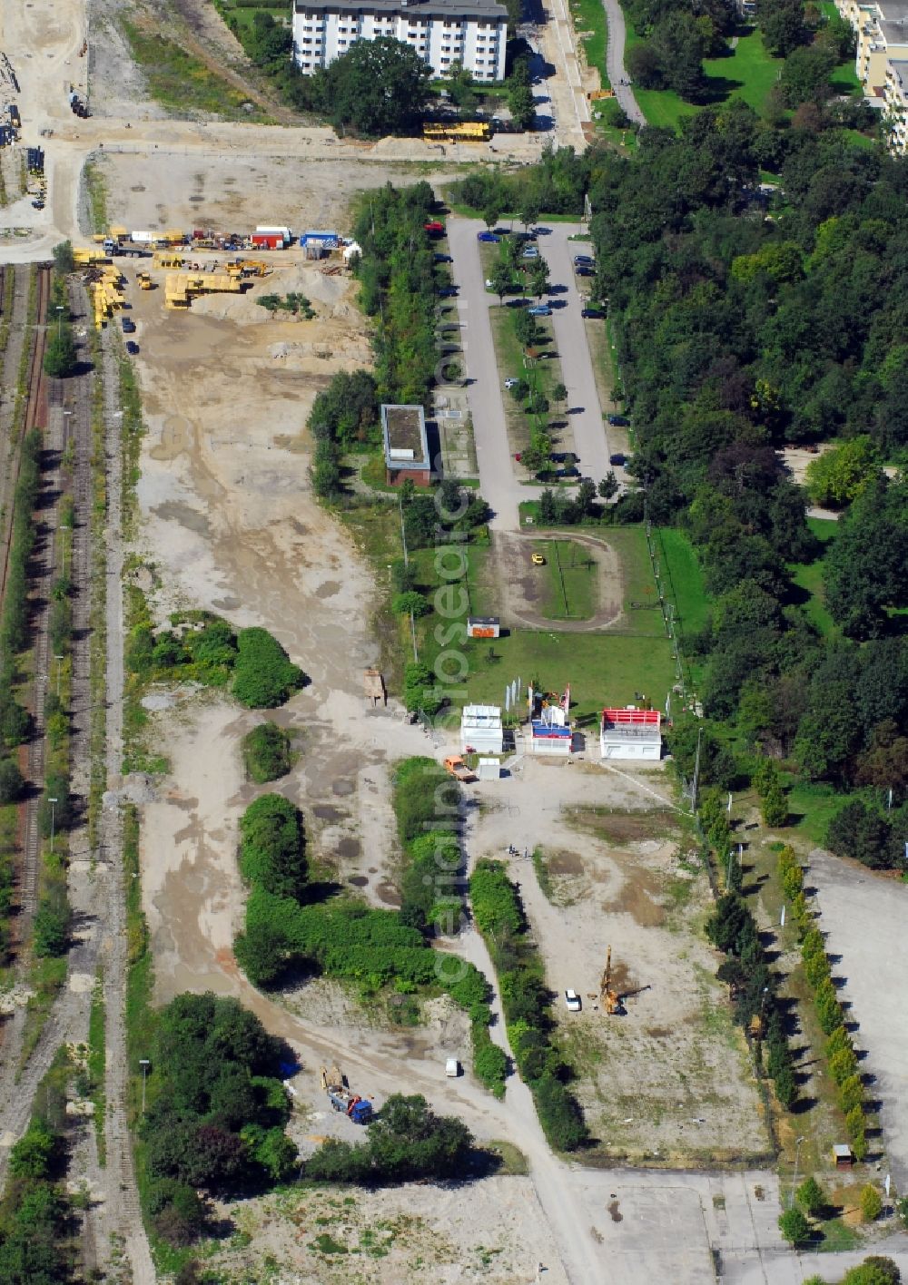 München from the bird's eye view: Construction site to build a new multi-family residential complex Am Hirschgarten in the district Neuhausen-Nymphenburg in Munich in the state Bavaria, Germany