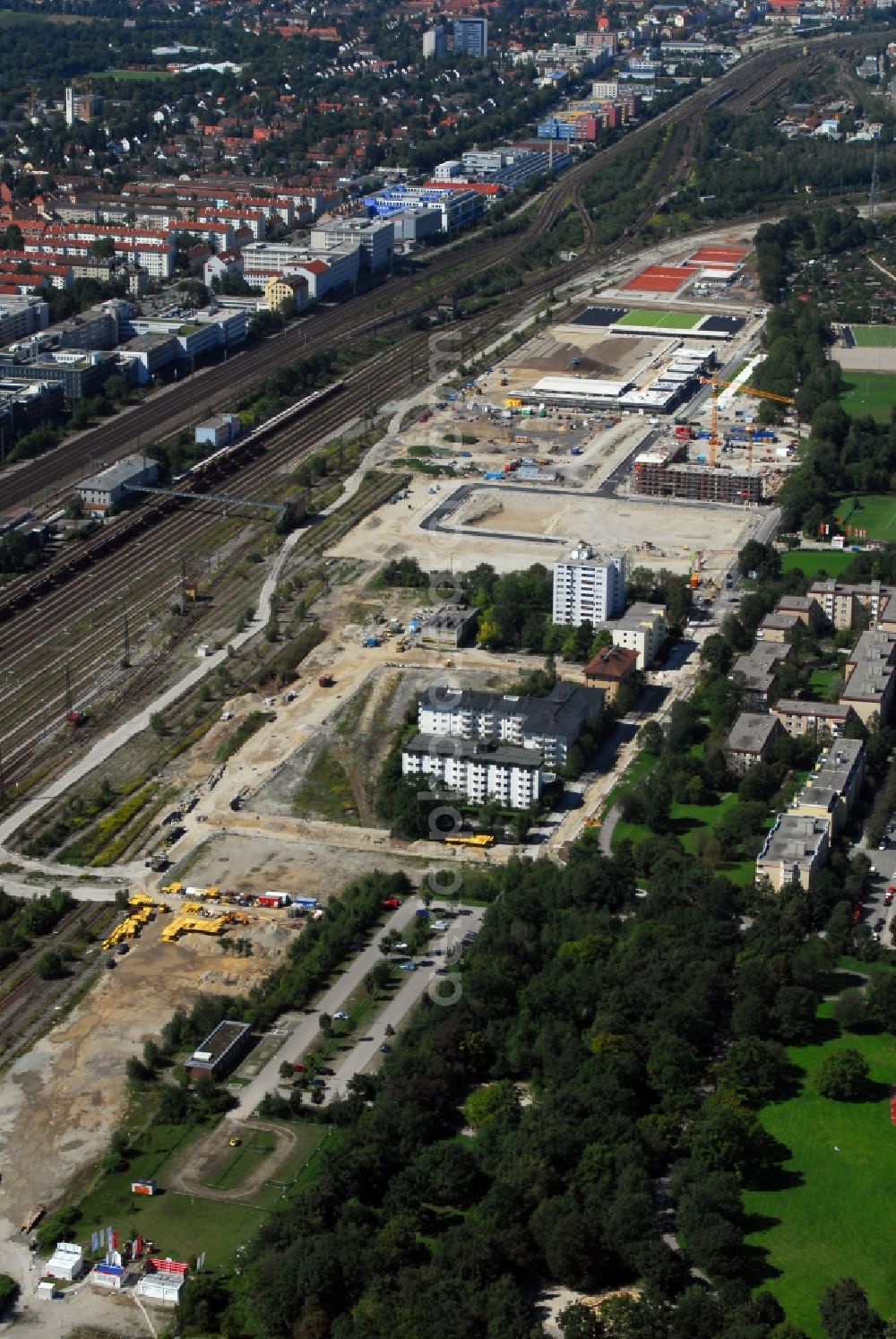 München from the bird's eye view: Construction site to build a new multi-family residential complex Am Hirschgarten in the district Neuhausen-Nymphenburg in Munich in the state Bavaria, Germany