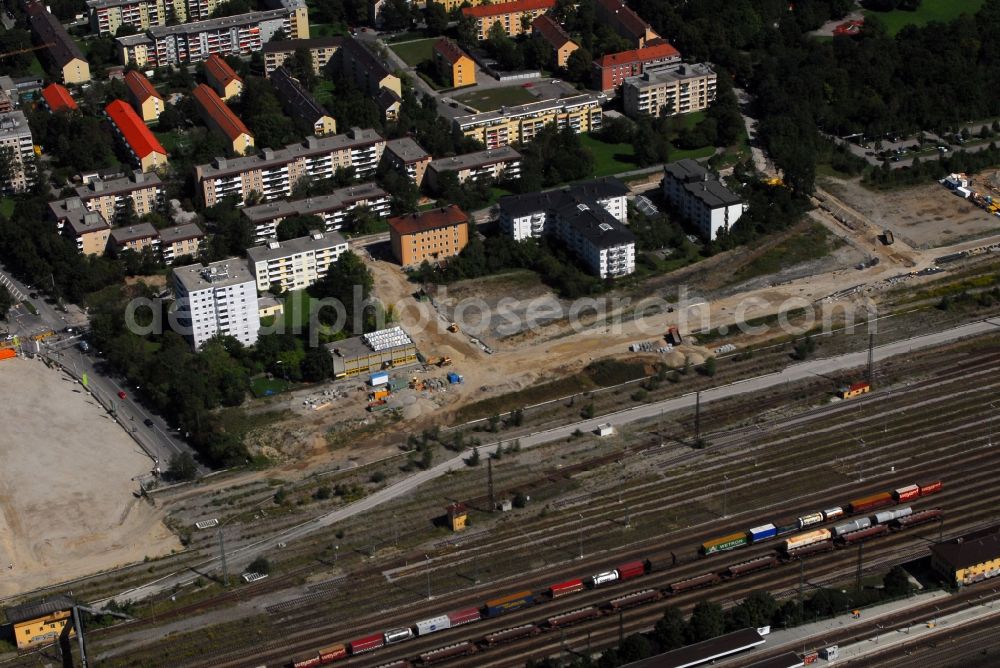 München from the bird's eye view: Construction site to build a new multi-family residential complex Am Hirschgarten in the district Neuhausen-Nymphenburg in Munich in the state Bavaria, Germany