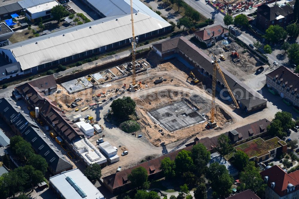 Karlsruhe from the bird's eye view: Construction site to build a new multi-family residential complex HOFGARTEN KARREE on Kussmaulstrasse in Karlsruhe in the state Baden-Wurttemberg, Germany