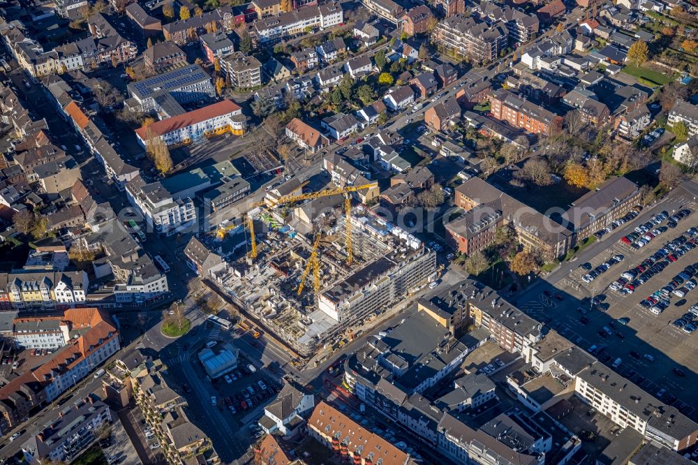 Aerial photograph Moers - Construction site to build a new multi-family residential complex Homberger Strasse - Otto-Hue-Strasse - Bankstrasse in the district Asberg in Moers in the state North Rhine-Westphalia, Germany