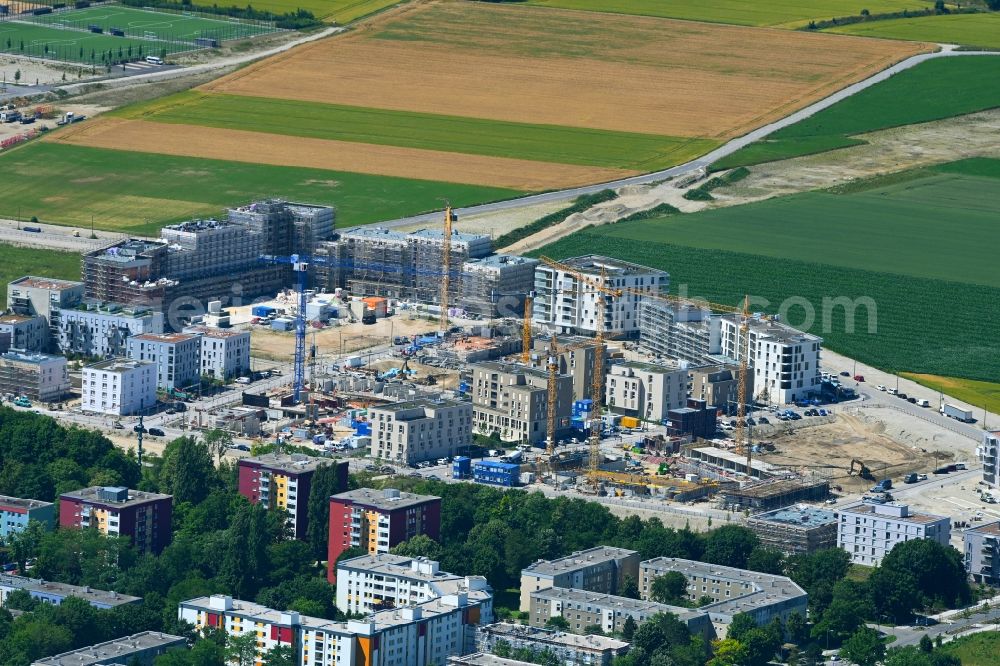 München from the bird's eye view: Construction site to build a new multi-family residential complex Hoerweg - Aubinger Allee - Christel-Sembach-Krone-Strasse in the district Aubing in Munich in the state Bavaria, Germany