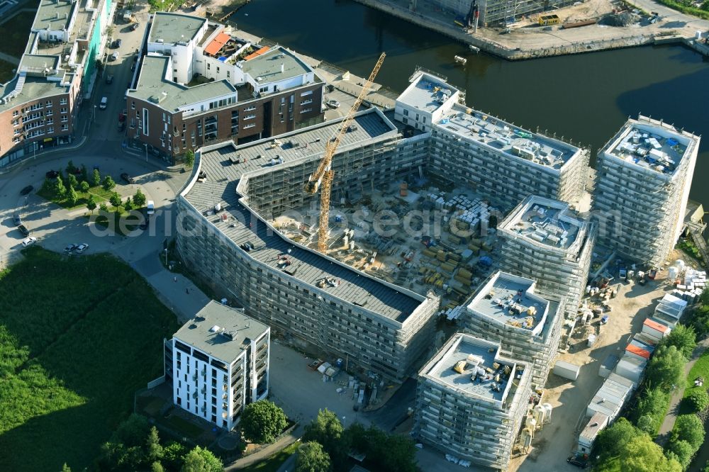 Rostock from above - Construction site to build a new multi-family residential complex Inselquartier on Gaffelschonerweg - Loggerweg in Rostock in the state Mecklenburg - Western Pomerania, Germany