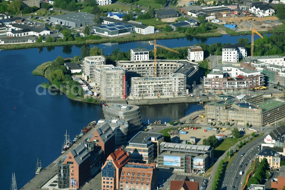 Aerial image Rostock - Construction site to build a new multi-family residential complex Inselquartier on Gaffelschonerweg - Loggerweg in Rostock in the state Mecklenburg - Western Pomerania, Germany