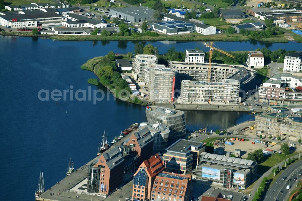 Rostock from above - Construction site to build a new multi-family residential complex Inselquartier on Gaffelschonerweg - Loggerweg in Rostock in the state Mecklenburg - Western Pomerania, Germany