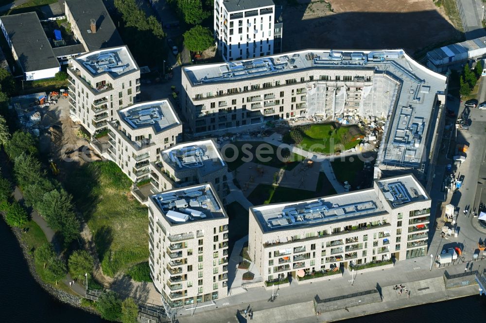 Rostock from above - Construction site to build a new multi-family residential complex Inselquartier on Gaffelschonerweg - Loggerweg in Rostock in the state Mecklenburg - Western Pomerania, Germany