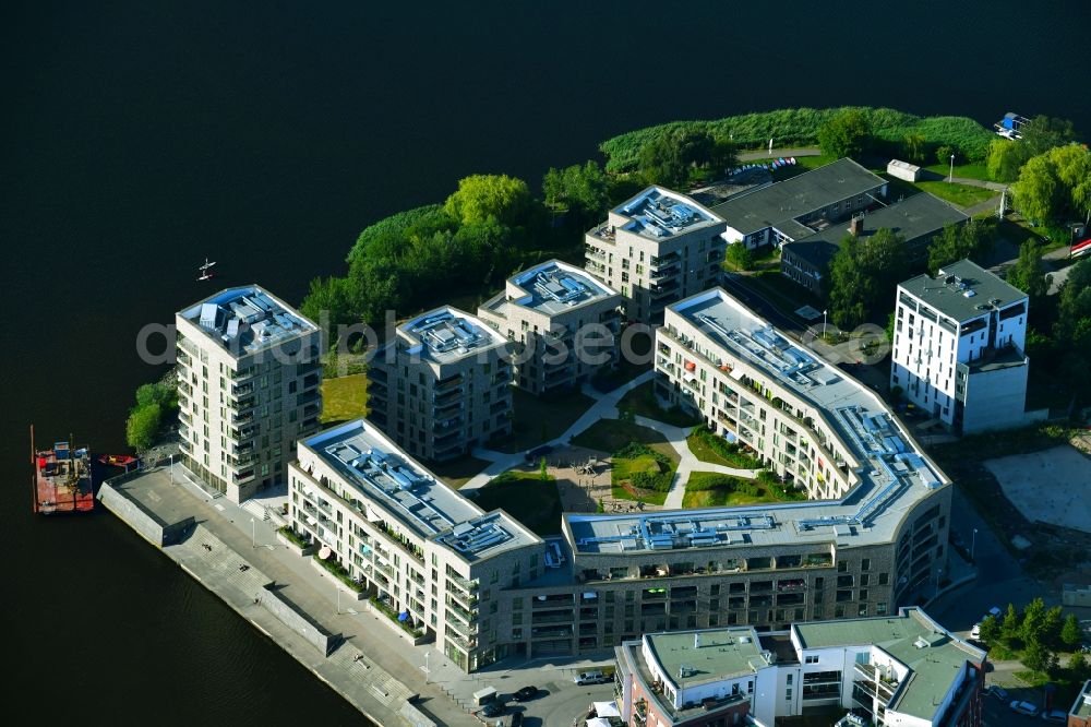 Rostock from the bird's eye view: Construction site to build a new multi-family residential complex Inselquartier on Gaffelschonerweg - Loggerweg in Rostock in the state Mecklenburg - Western Pomerania, Germany